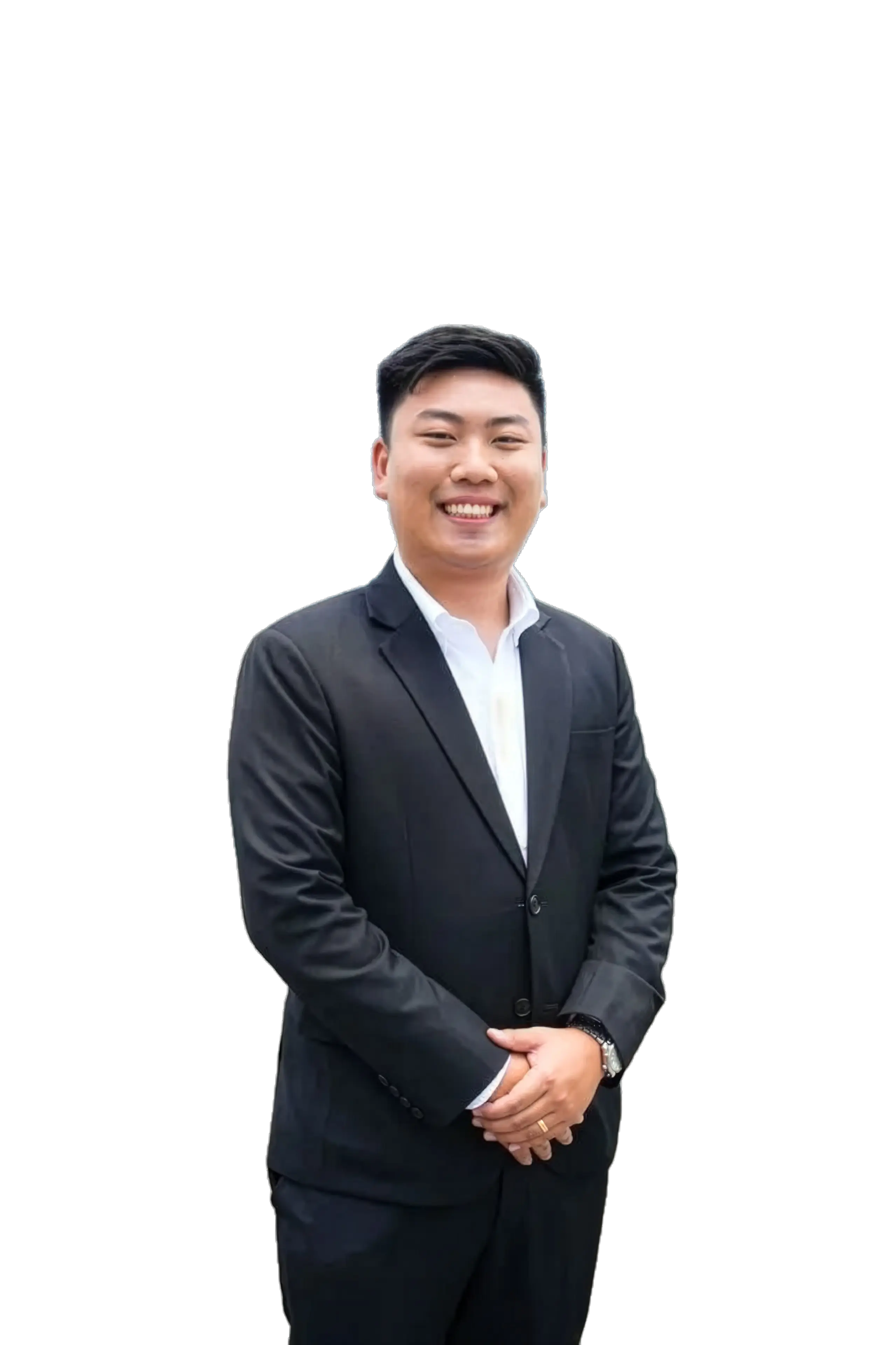 Rayner Teo smiling in a black suit jacket and white shirt